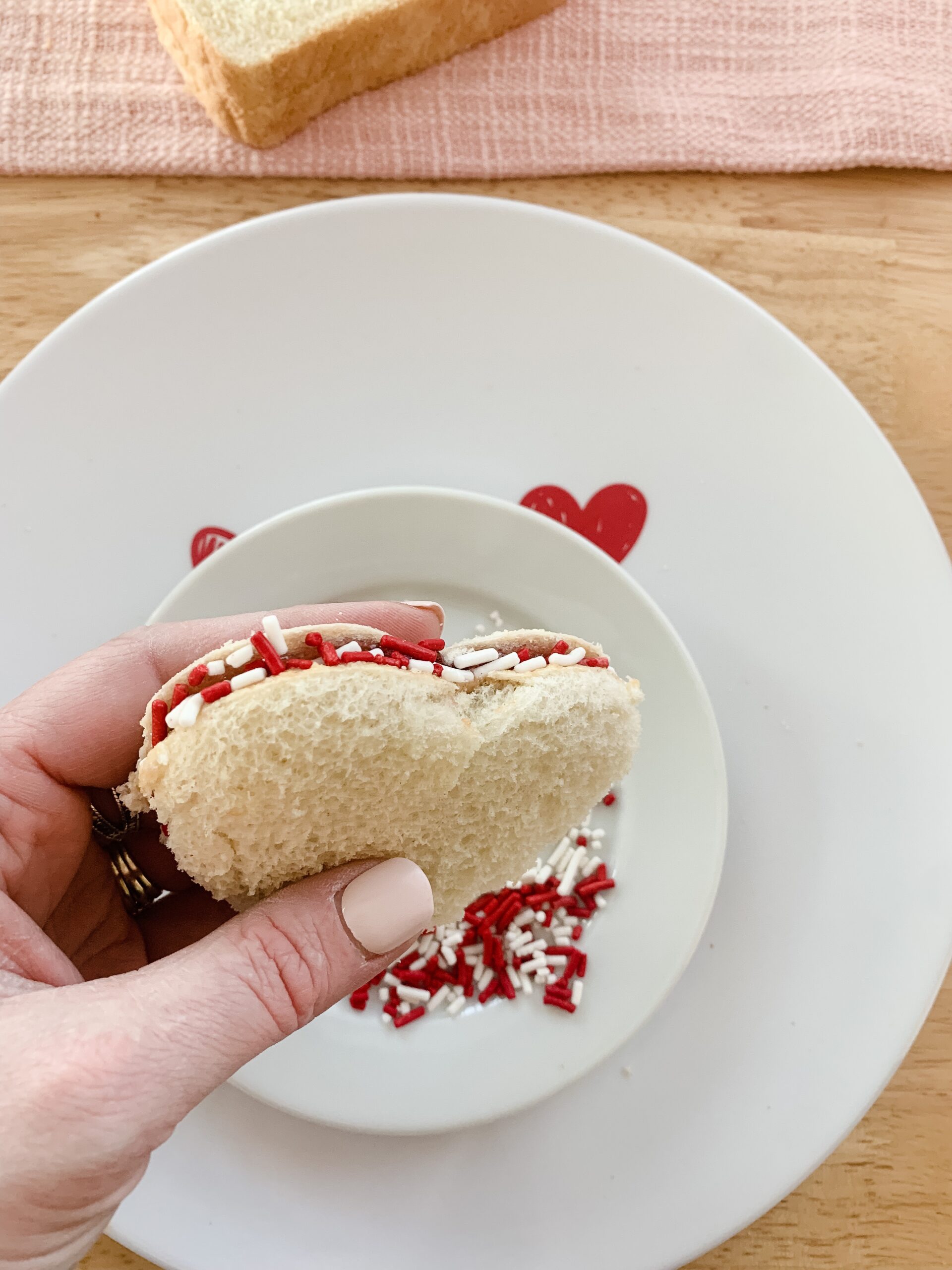 sprinkle covered Valentine's peanut butter and jelly sandwich
