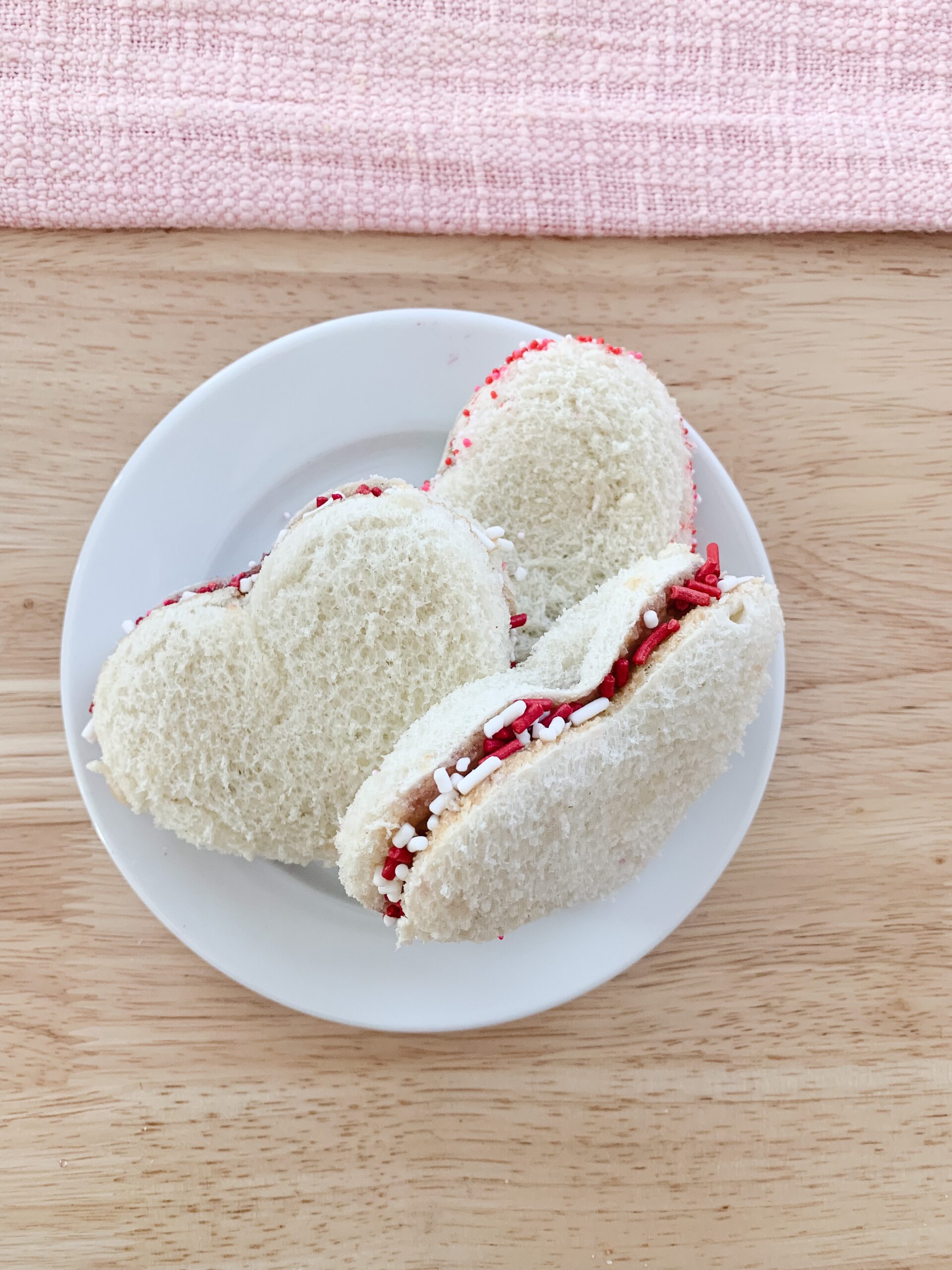 Valentine's Day heart shaped peanut butter and jelly sandwiches