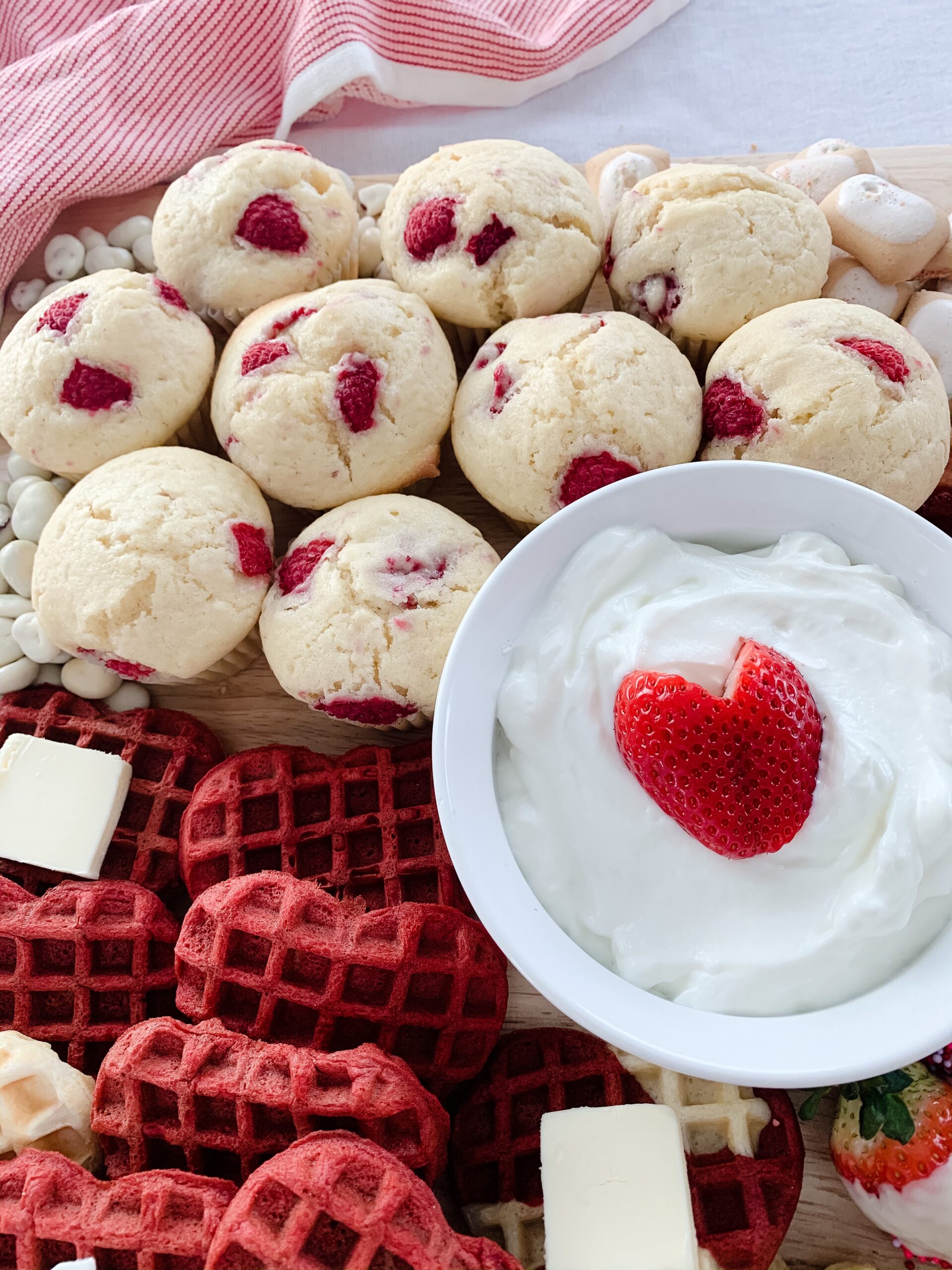 heart shaped strawberry in yogurt