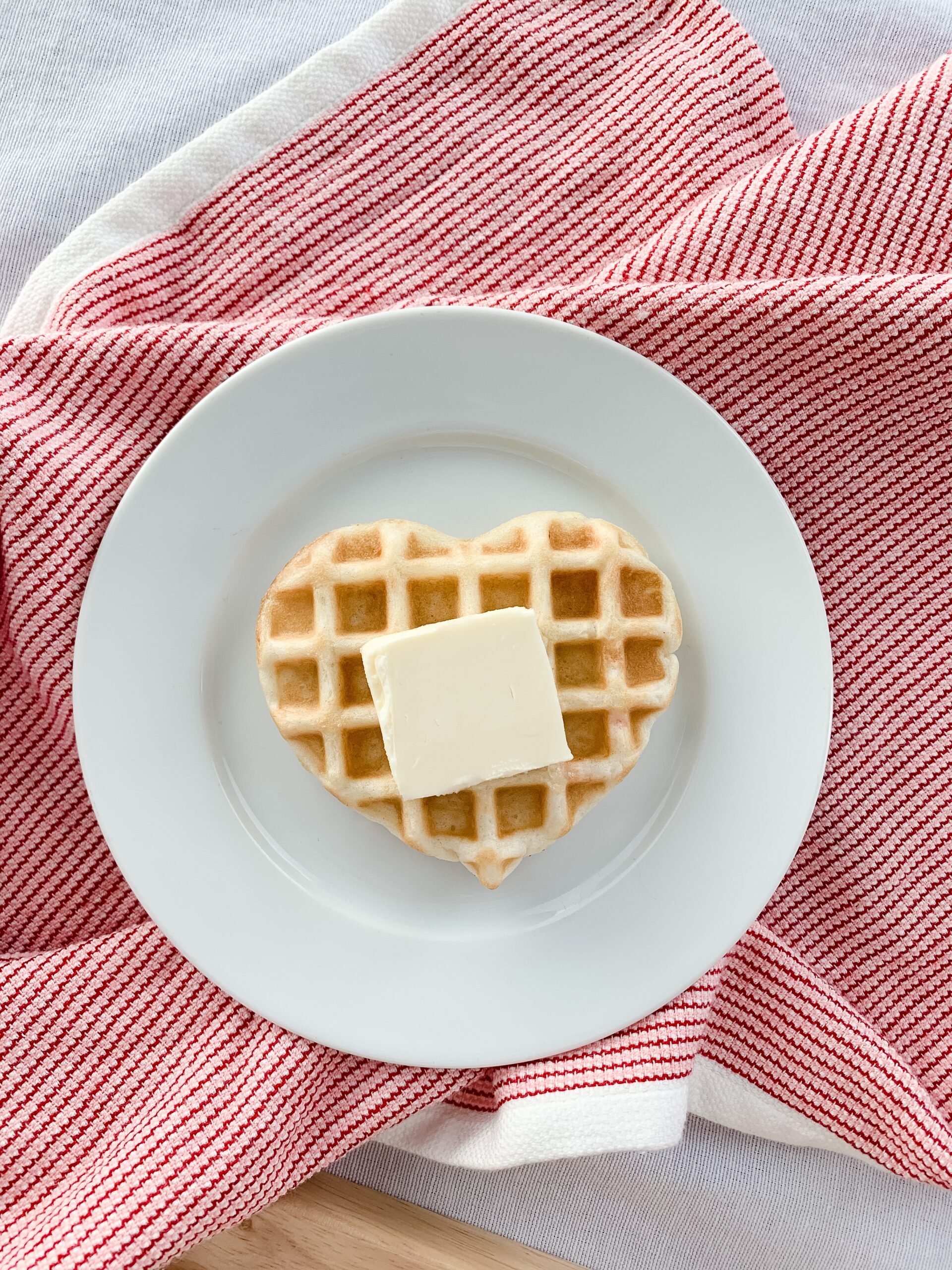 heart shaped waffle on a white plate