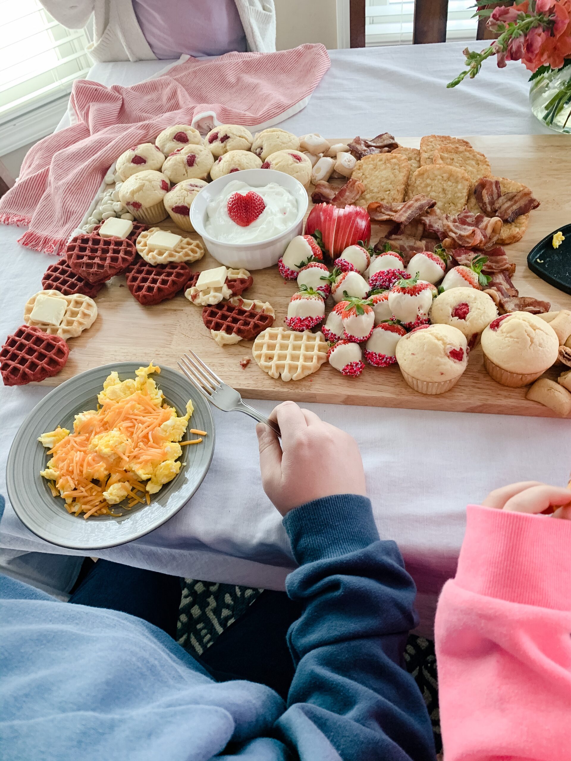 kids enjoying a valentines breakfast