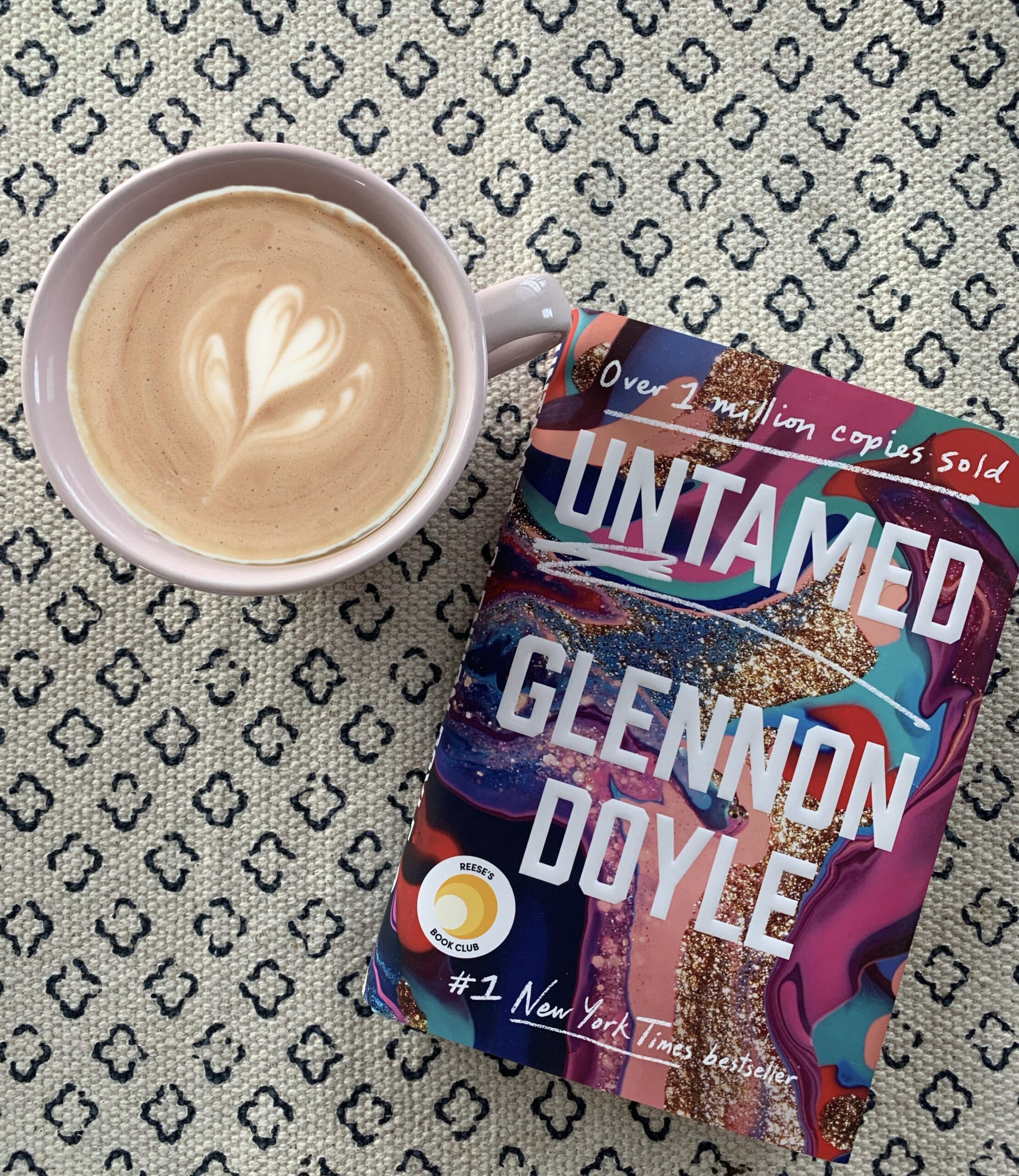 Brightly colored book cover for Untamed by Glennon Doyle Melton