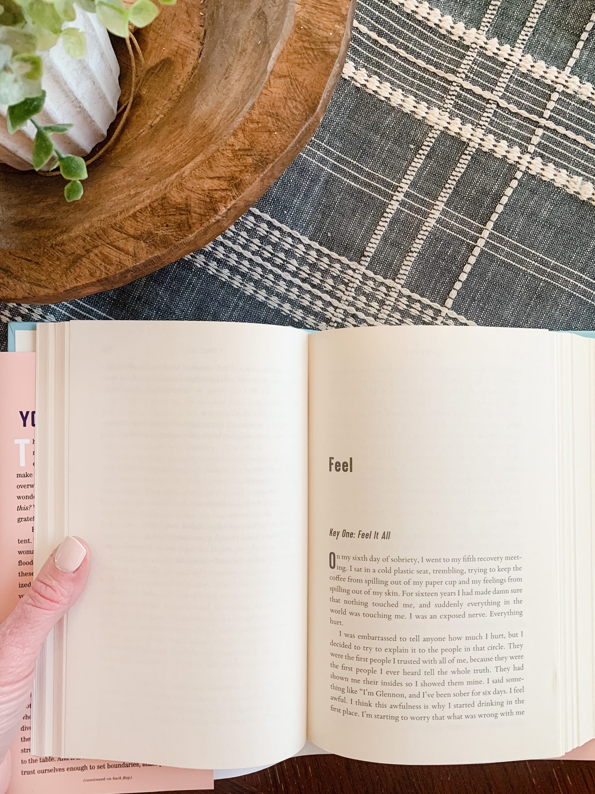 photo of female hand holding Untamed book by Glennon Doyle Melton